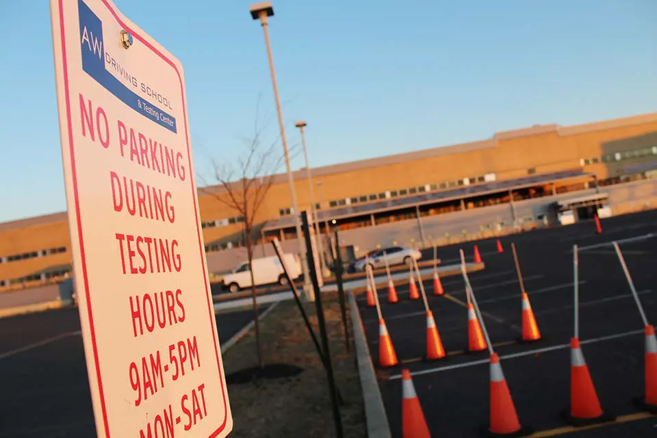 Aw Driving School Parking Area sign